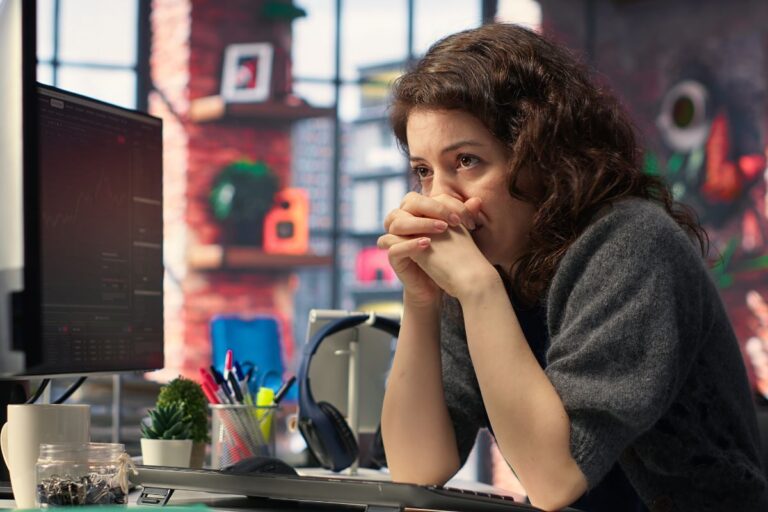 woman at work looking worried