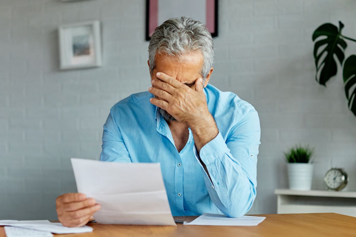 Older man looking worried