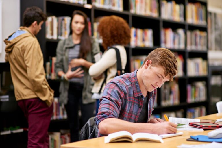 college students in a library