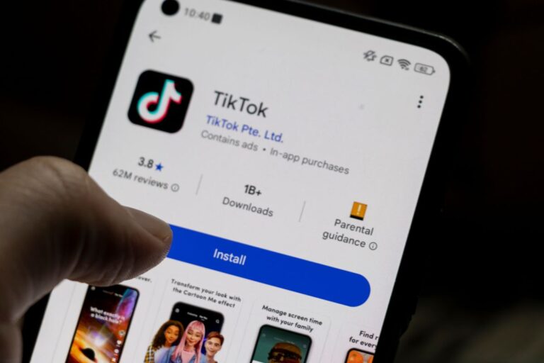 phone on the screen to download tik tok