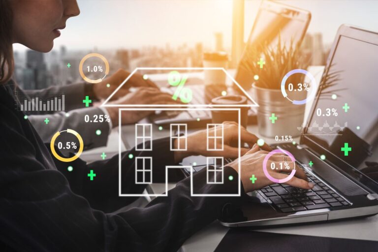 woman on a laptop with a house and percentages around it