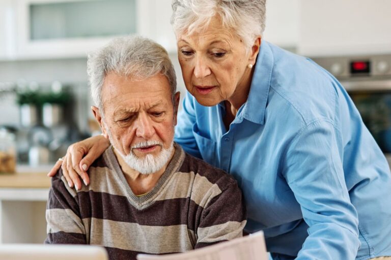 Older couple looking at finances