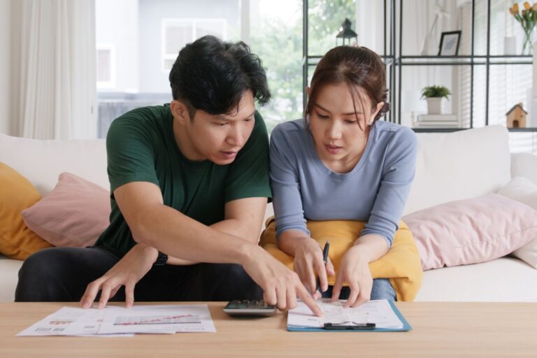 couple looking at paperwork