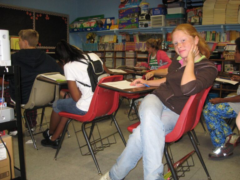 Students seated at desks in a classroom