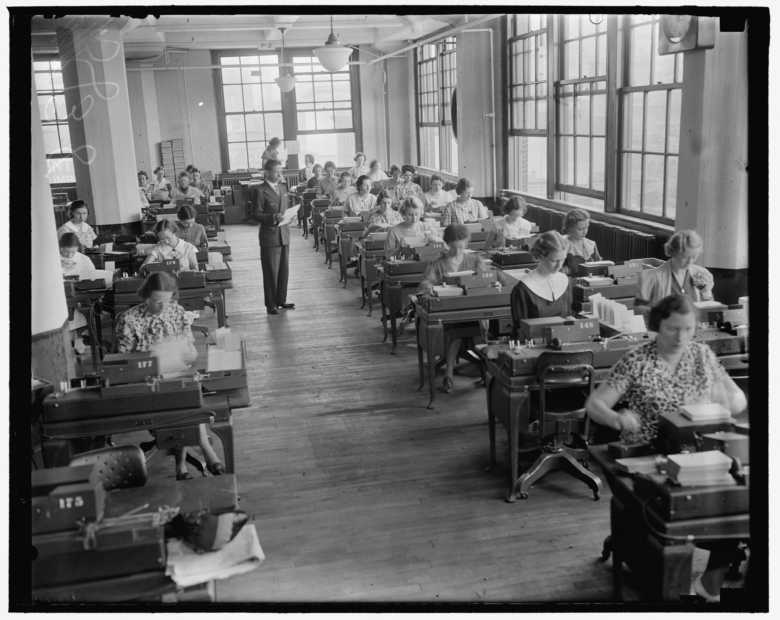 Clerks filing employee record cards at the Social Security Board Records Office in Baltimore in the 1930s